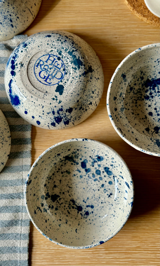 Handmade ceramic blue platter porridge bowl from herridge pottery - on table