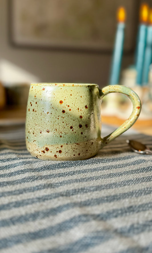 Handmade ceramic celadon green mugs from Herridge pottery - side