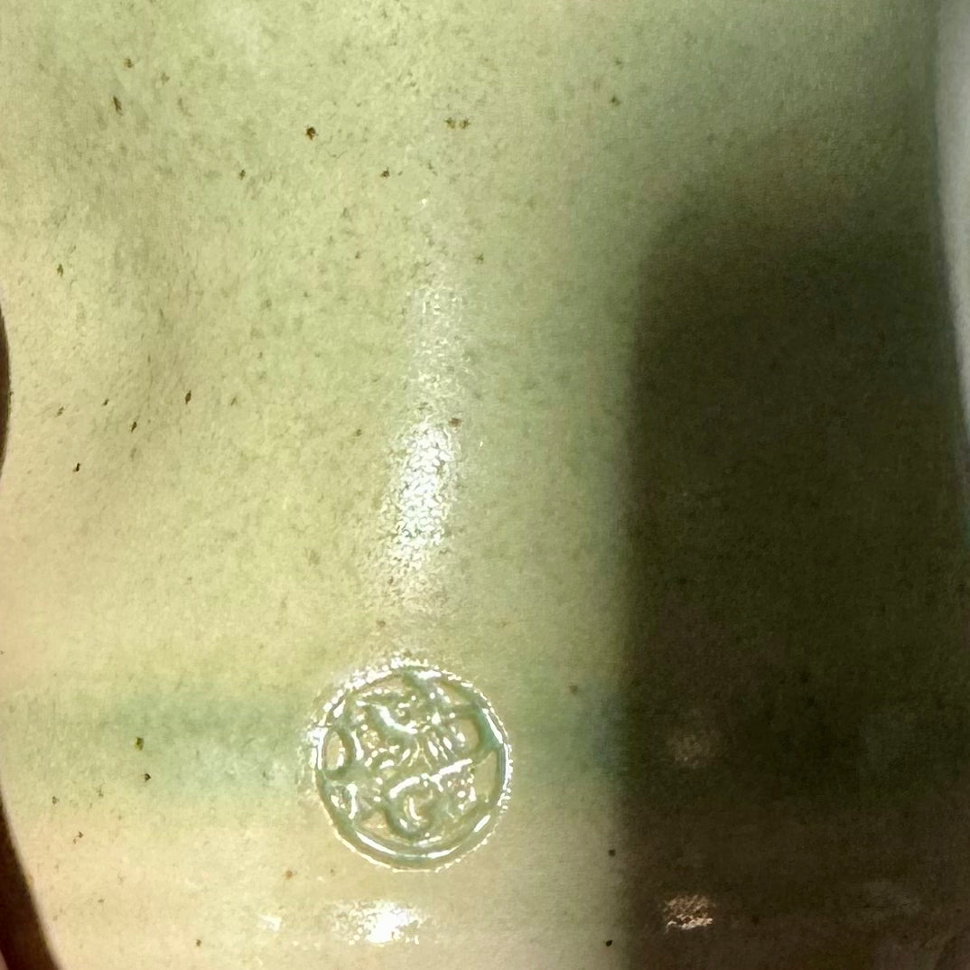 Handmade ceramic dimple coffee cup by Herridge Pottery in Celadon Green.