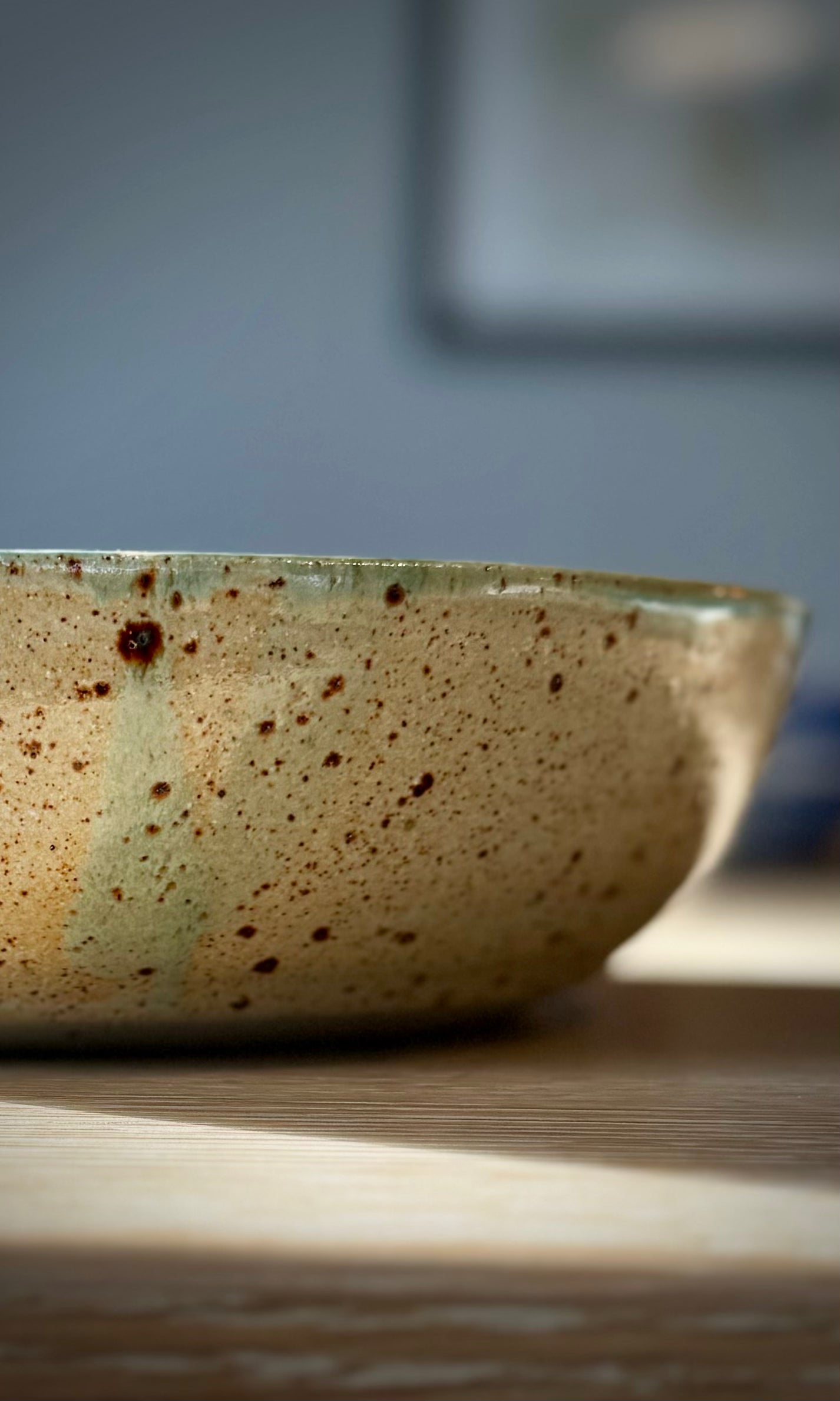 Handmade ceramic feasting bowl in celadon green from Herridge Potter - close up