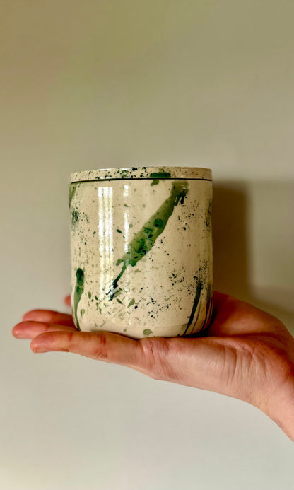 Handmade ceramic mallard splatter butter bell from Herridge pottery - held
