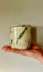 Handmade ceramic mallard splatter butter bell from Herridge pottery - held