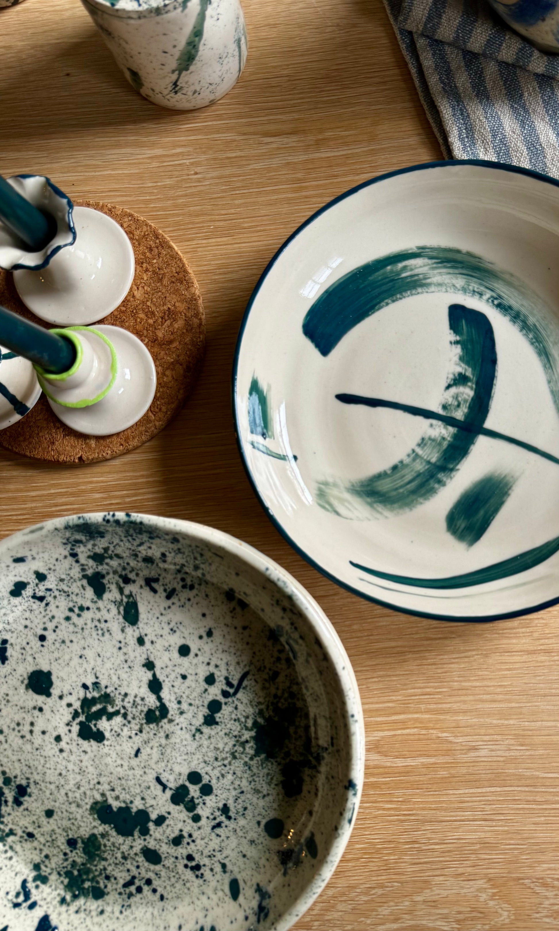 Handmade ceramic mallard swoosh  and splatter extra large feasting bowls from Herridge Pottery - on table