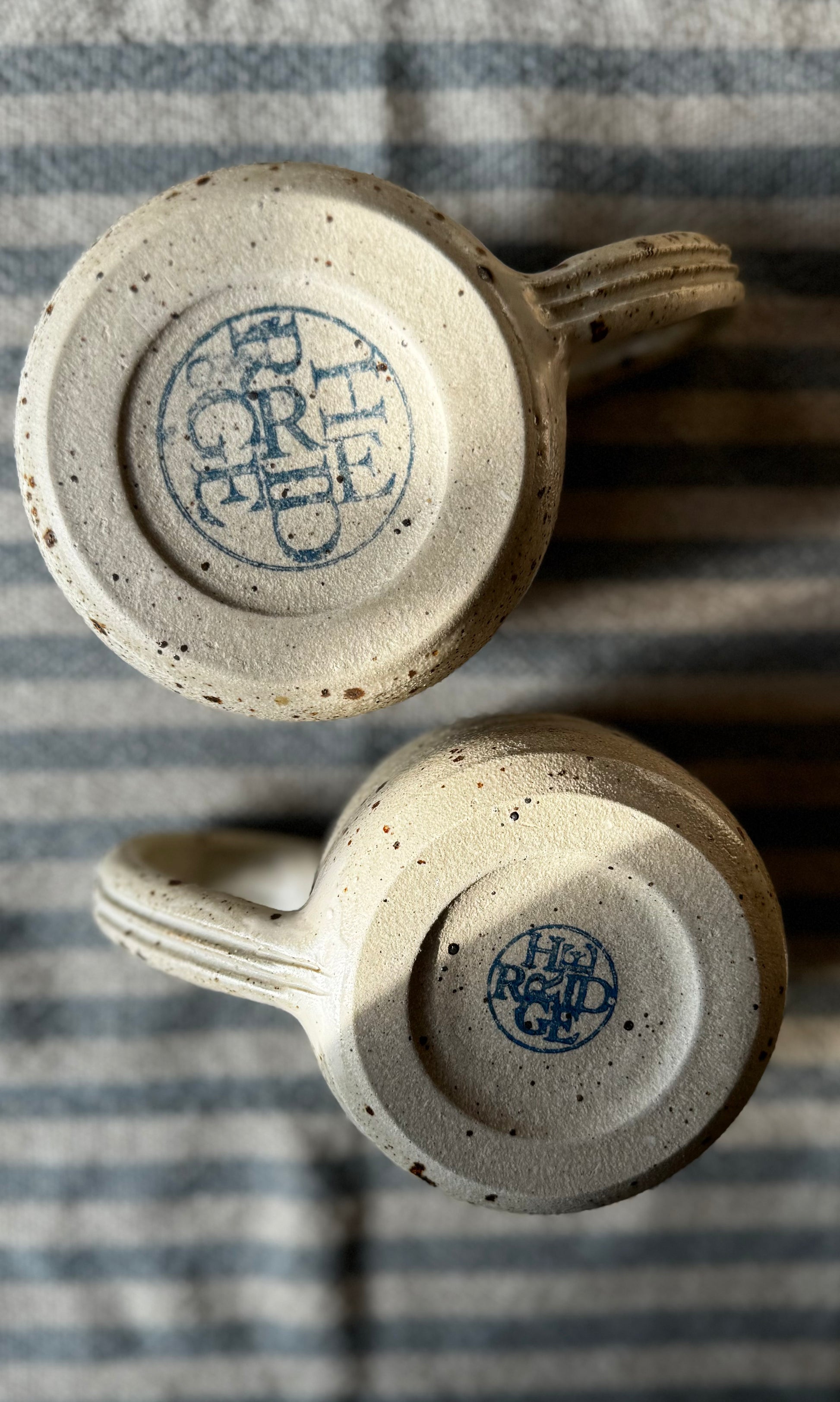 Handmade ceramic oatmeal mug from herridge pottery - on table bottom