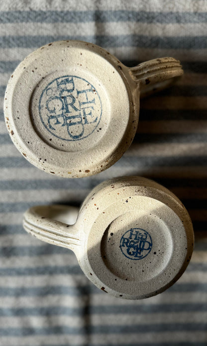 Handmade ceramic oatmeal mug from herridge pottery - on table bottom
