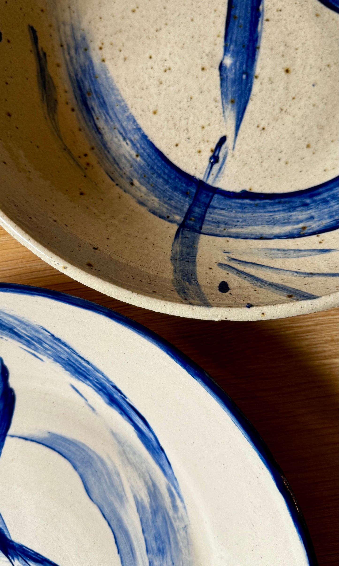Ceramic plates with blue abstract designs 